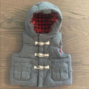Baby Gap grey puffy vest with buffalo plaid liner.